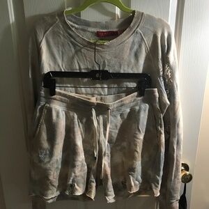 N.philanthropy distressed sweatshirt and shorts.